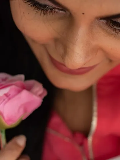 A delicate close-up focusing on a simple, beautiful detail. This artistic shot highlights a moment of quiet appreciation.