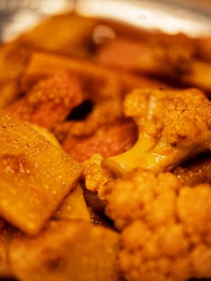 A close up of our delicious Gajar Gobhi Shalgam pickle. You can see the chunks of vegetables coated in our rich, flavourful masala. It's a winter comfort like no other.