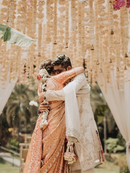 A heartfelt hug between the couple right after the ceremony, a quiet moment of "we did it."