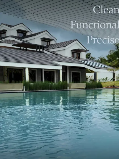 A quiet dialogue between structure and water. This classic colonial-style building overlooks a serene swimming pool, creating a peaceful and picturesque setting.