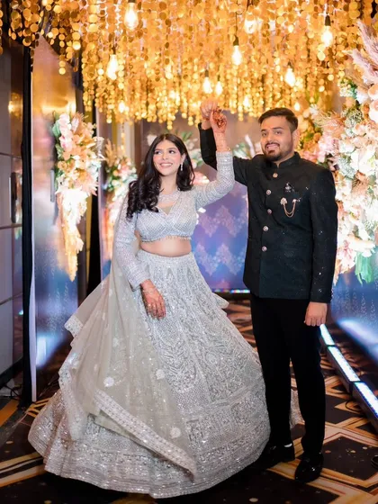 A grand entrance shot under a canopy of lights.