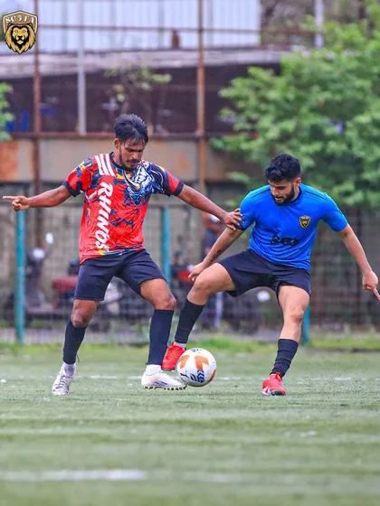 A tough tackle in the midfield. Our players are trained to be strong and decisive in winning back possession.