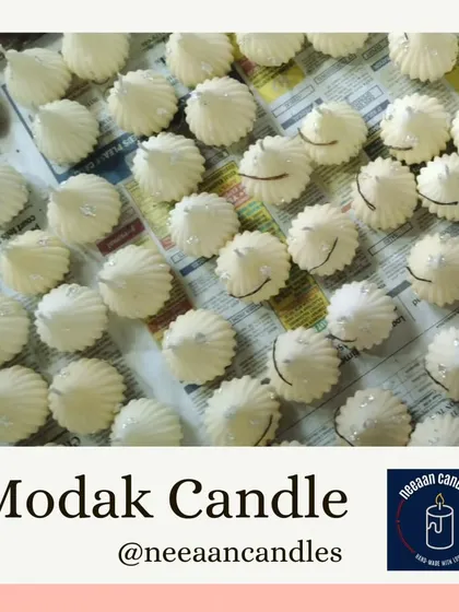 A collection of our white modak candles, looking pure and serene. They are a sacred offering for Lord Ganesha, meant to bring blessings and remove obstacles.