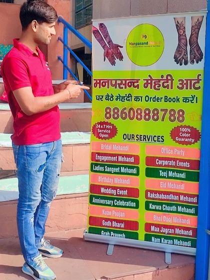 A photo of me with our service banner, highlighting the wide range of occasions we cater to.