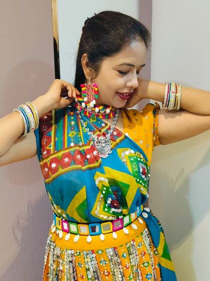 This colourful chanya choli with mirror work is another fantastic option for Garba nights. The matching jewellery is also available for rent.