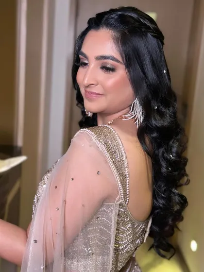 A side view of the simple yet elegant reception hairstyle.