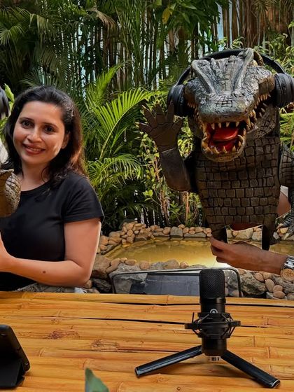 Posing with the crocodile puppets during the promo shoot. These characters were designed to be fun and engaging, hosting their own "reacts" podcast for the film's promotion.