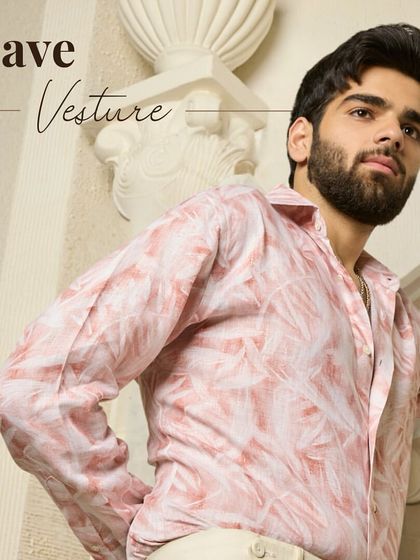 Suave Vesture. This image captures the smooth and sophisticated feel of the pink abstract linen shirt, a key piece for any modern, stylish wardrobe.