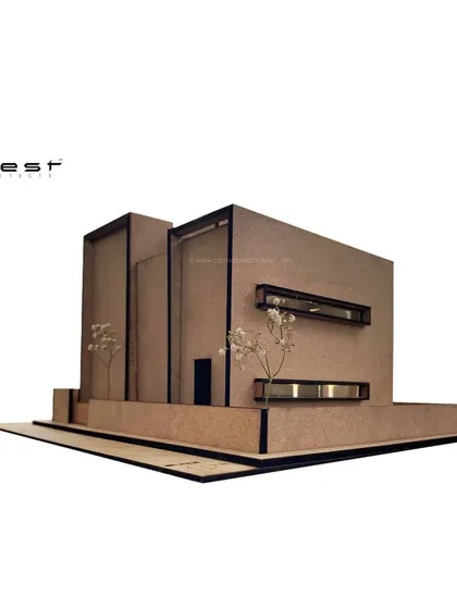 A physical model of the 'Framed House.' We use architectural models as a tool to study form, mass, and light, helping us refine the design before construction begins.