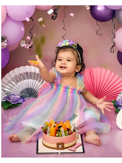 A rainbow dress for a day full of color and joy. My first birthday cake smash sessions are all about celebrating this huge milestone with lots of messy fun.