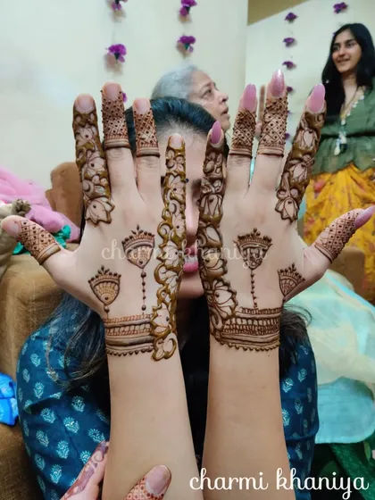 A fun and quirky design with different motifs on each hand. I love creating custom looks that reflect my client's personality!