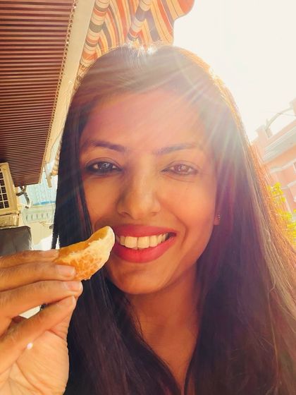 Enjoying winter sunshine with an in-season orange. This simple pleasure combines the mood-boosting effects of sunlight with a dose of immune-boosting Vitamin C.