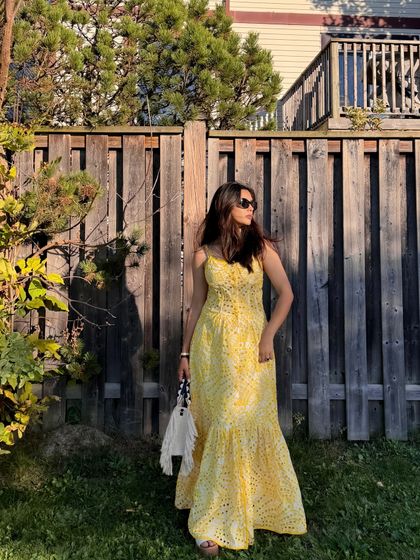 A classic pose showing off the summer dress in beautiful golden hour lighting.