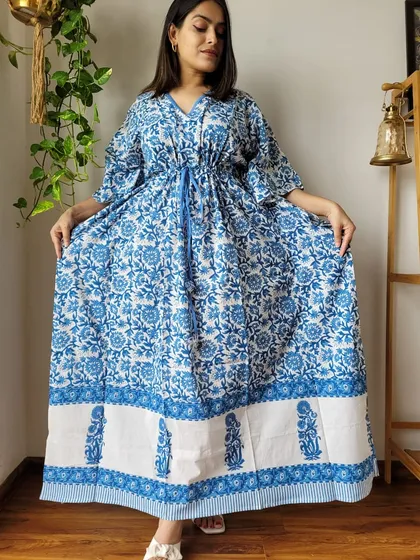 My hand-block printed cotton kaftan in a refreshing blue and white floral design. This free-size kaftan is made from 100% pure cotton, offering a relaxed and comfortable fit for lounging or casual wear.