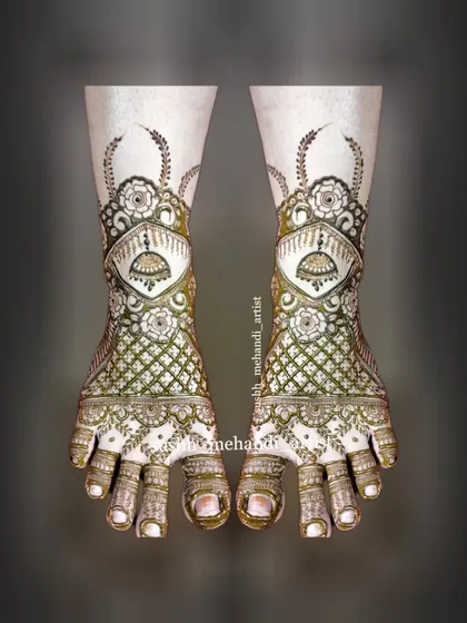 A very detailed and traditional bridal foot design. It features jhumkas, jaali work, and floral elements for a complete look.