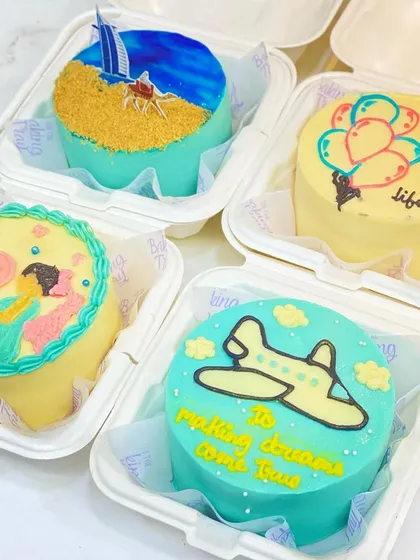 Life is an adventure, and these bento cakes are here to celebrate it. I created these custom designs for a mom-to-be, a travel dream, and other big life moments.