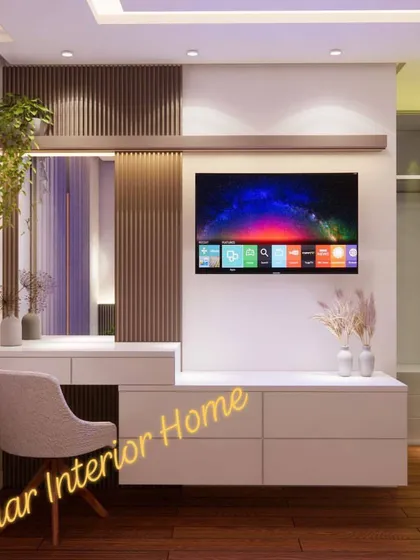 The TV unit in this bedroom also serves as a dressing table, a smart and space-saving solution for modern apartments.