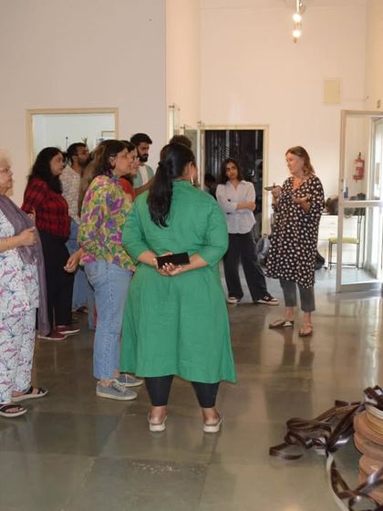 A wide shot of Clare Arni's walkthrough with the MAP Bangalore team, showing the group's engagement.