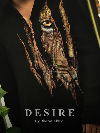 Another detail shot of the front of the tiger-print shirt, highlighting the fierce and artistic design.