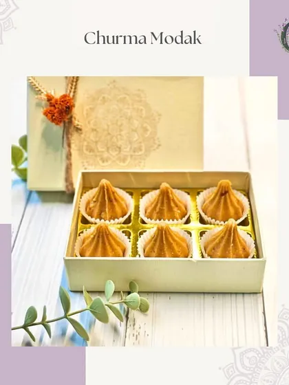 A box of our classic Churma Modaks, a traditional and beloved sweet for Ganesh Chaturthi.