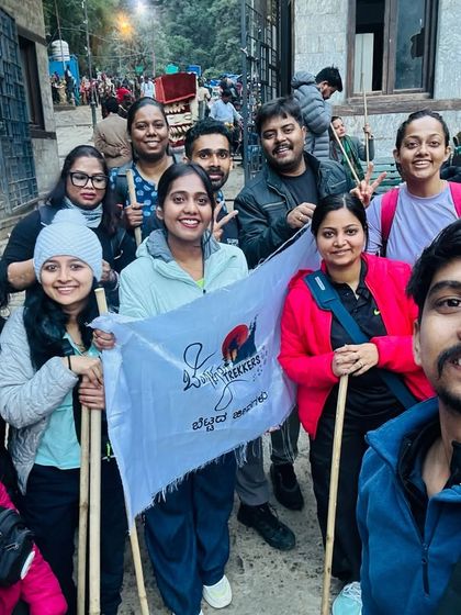 Our group, ready with their walking sticks, at the start of the Kedarnath trek. The energy and devotion in the air are palpable.