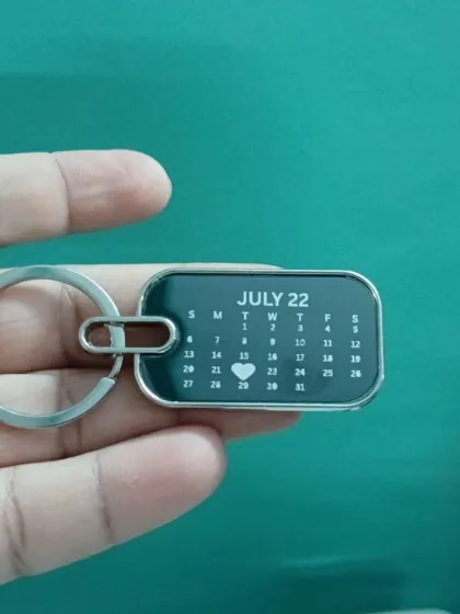 A special date to remember. This calendar keychain is customized with July 22nd marked with a heart, a perfect anniversary or birthday gift.