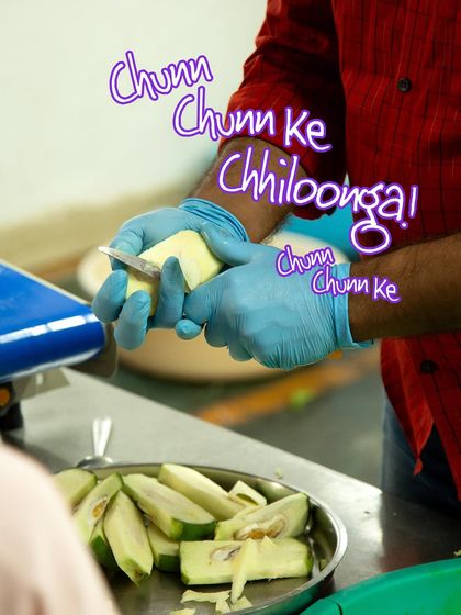 The process of peeling mangoes continues, a labour of love that is essential for the perfect pickle.