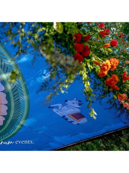 A detail of the mandala ceiling, showing the traditional motifs of cows that were incorporated into the design.