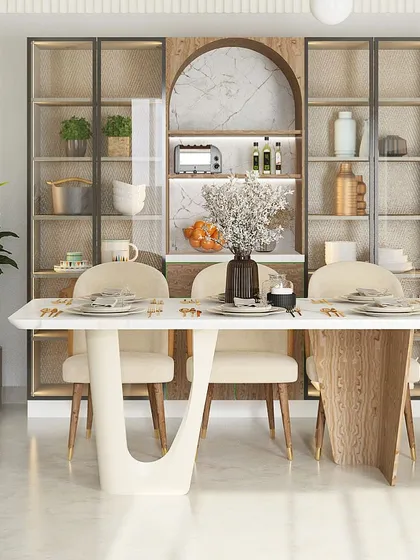 We designed this elegant 6-seater dining set for a project in DLF Phase 1, Gurgaon. The table's unique sculptural base is a conversation starter, while the full-height crockery unit provides ample, stylish storage.
