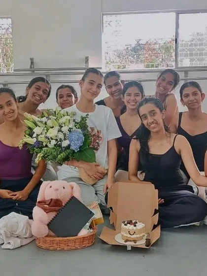 More than a studio, we are a family. This moment captures our students and faculty celebrating one of our own as she embarks on her professional journey at a top international performing arts school.