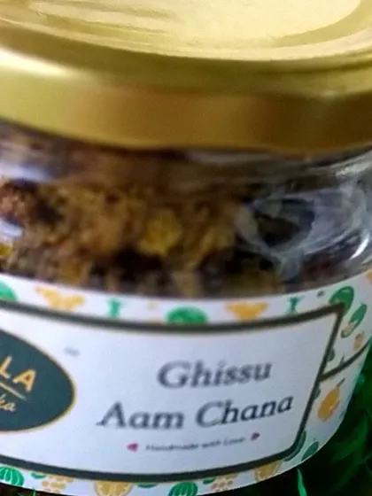 A close-up of the Ghissu Aam Chana pickle jar. This is one of my more unique recipes, combining the tang of mango with the earthiness of chana.