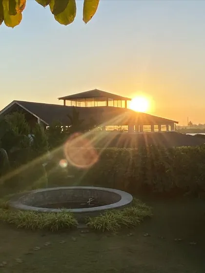 The sun's first rays break over our yoga hall, casting a warm glow. Mornings here are a sacred time for reflection, yoga, and connecting with nature.