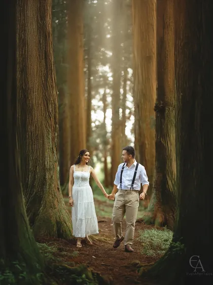 Walking together through a cathedral of ancient trees, their path lit by soft, filtered sunlight. This is the essence of my enchanted forest sessions, creating timeless, romantic portraits that feel intimate and grand all at once.