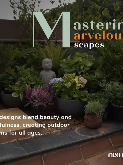 I delight in creating lush, marvelous scapes that feel both abundant and artfully composed. This garden bed combines a variety of textures and colors, from flowering hydrangeas to sculptural succulents, with a small, serene Buddha statue nestled within. It’s a testament to how thoughtful plant arrangement can create a playful and beautiful haven.