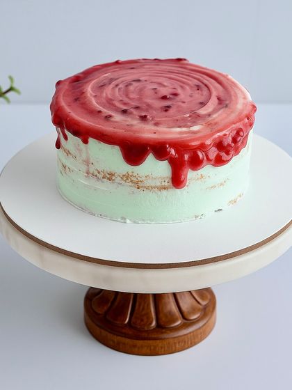This Raspberry Basil Naked Cake is one of my most surprising flavor combinations. A soft basil vanilla sponge is layered with white chocolate cream and a tangy raspberry compote. It’s fresh, light, and absolutely delicious.