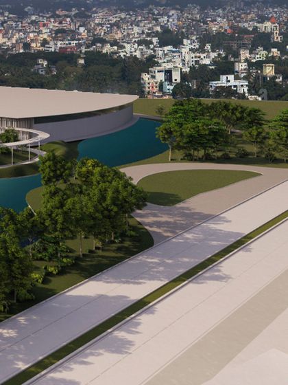 A rendering of a large campus by the water. We created this space to be all about balance, where work meets style. The clean, modern design is built for productivity and functionality.