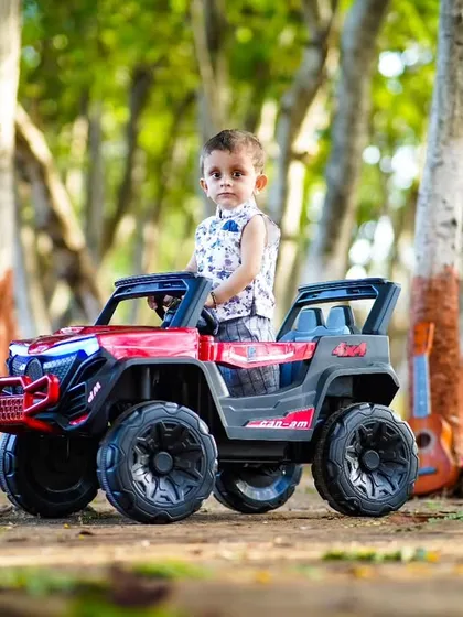 A full-sized kids' toy car is one of the many fun props I have for outdoor shoots. It always brings a smile to a child's face.