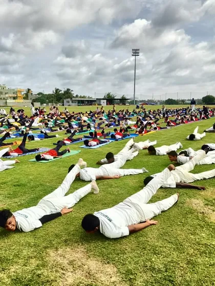 Our players perform the 'Bhujangasana' (Cobra Pose) during a group yoga session, which helps improve flexibility and core strength.