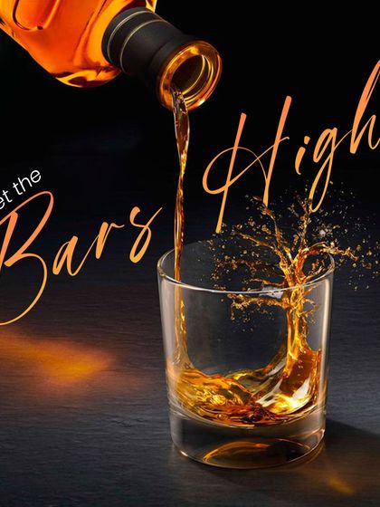 We set the bars high. This creative image, where a pour of whiskey forms a tree, symbolizes our commitment to crafting experiences, not just drinks.