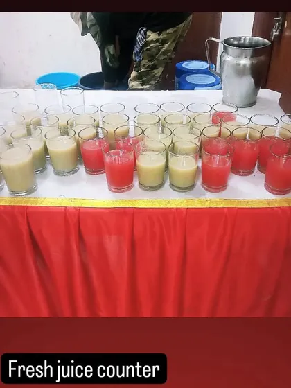A fresh juice counter offering different options to guests. This is a great way to provide refreshing welcome drinks at any event.