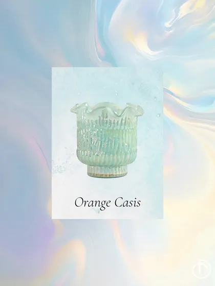 My Orange Casis fragrance, in a beautiful aqua-colored Zen Lotus votive, is designed to set a lively and calm rhythm for your day, perfect for your morning self-care rituals.