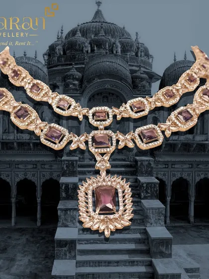 A full view of the elegant purple and zircon layered necklace. This piece is perfect for adding a touch of royal color and brilliant sparkle to your evening wear.