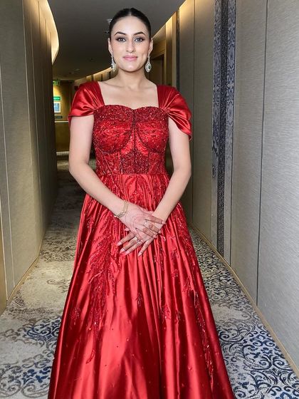 A sleek bun and brown smokey eyes are a perfect combination for a bridesmaid or guest at a cocktail party. This look is chic, elegant, and timeless.