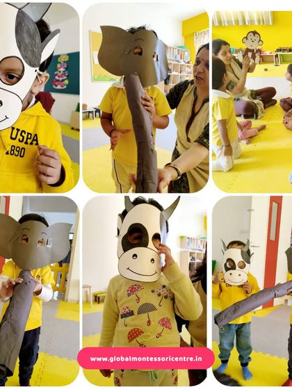Children wear handmade animal masks of cows and elephants, engaging in imaginative play and storytelling during our 'Animals' theme month.