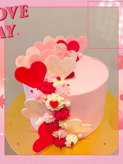 A beautiful and modern cake for your Valentine. This design features a cascade of pink, red, and white chocolate hearts, creating an elegant and romantic look.