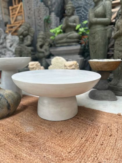 Our minimalist stone tables are designed to turn anything you place on them into art. This low, wide plinth-style table is perfect as a modern coffee table or a display stand for your favorite sculpture.