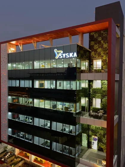 This is the corporate headquarters we designed for SYSKA in Pune, showcasing our expertise in large-scale architectural projects. The facade integrates a multi-story vertical garden, a design choice that was ahead of its time and demonstrates our commitment to biophilic architecture.