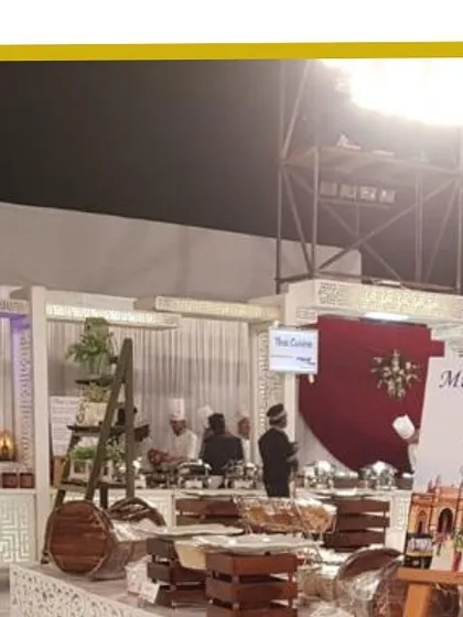 Our live chaat counter, complete with a "Mumbai Chaat" sign, brings the authentic street food experience to your event with a clean, professional setup.