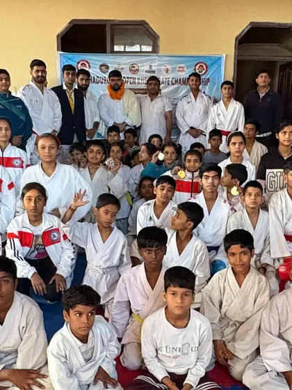 The entire group of champions from the district Khel Karate sports association. I am proud to lead these dedicated athletes.