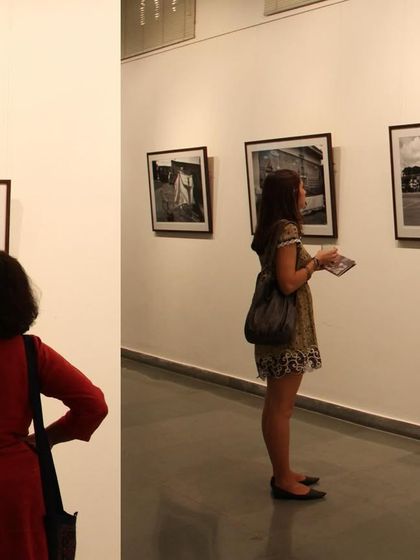 Visitors at a past exhibition, 'Face two Face', Cop Shiva's debut solo show from 2012. This shows our long-standing relationship with the artist.
